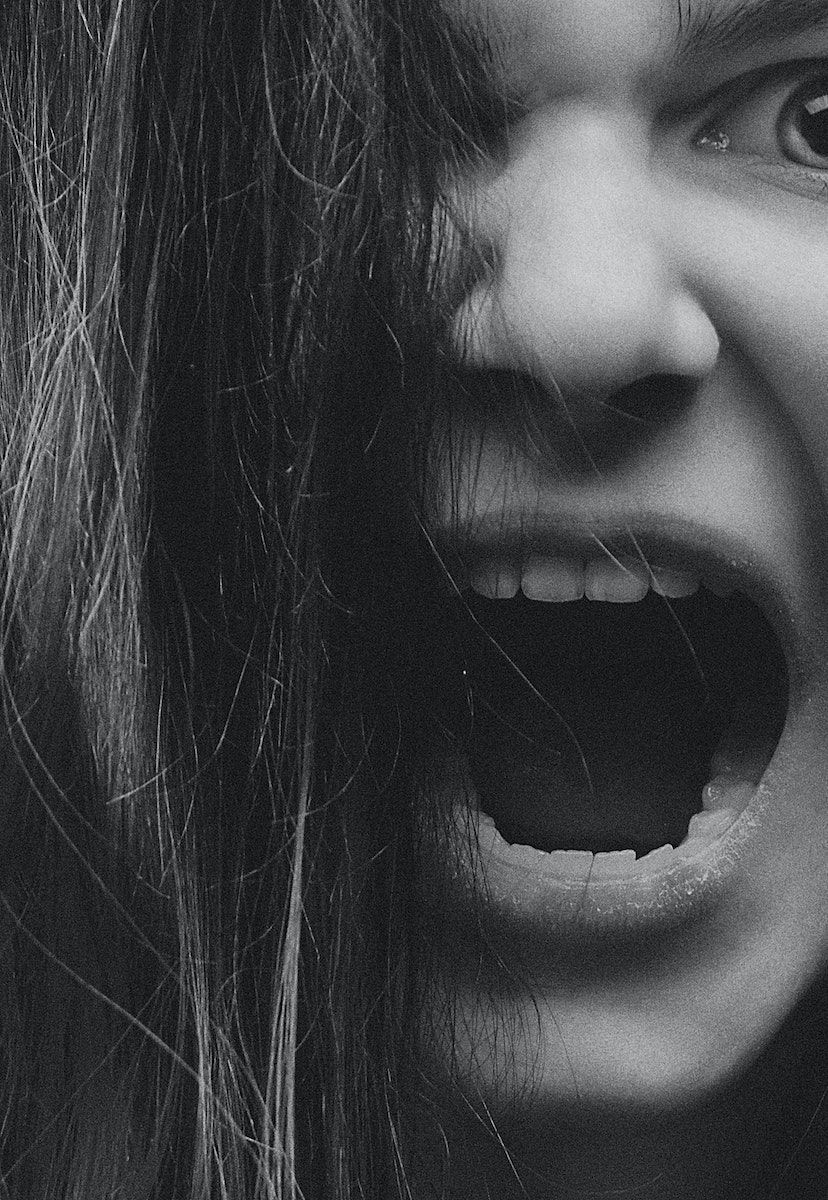Grayscale Photo of An Angry Woman